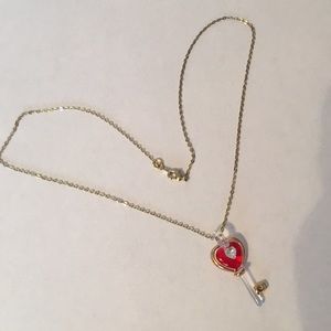 Crystal key necklace with crystal diamond accent.